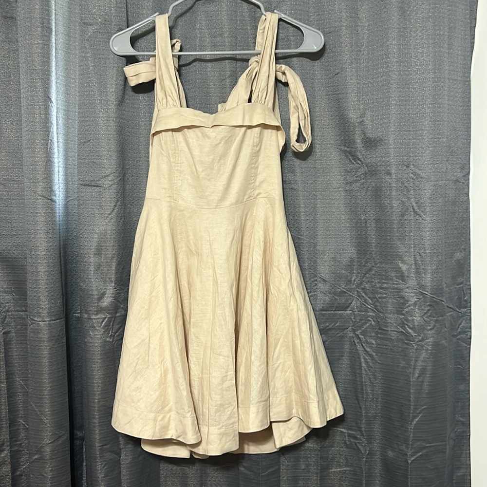 Cream dress with tie sleeves and side zipper